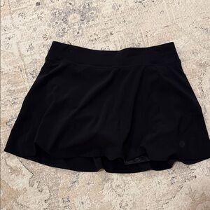 Light weight high rise tennis skirt in black